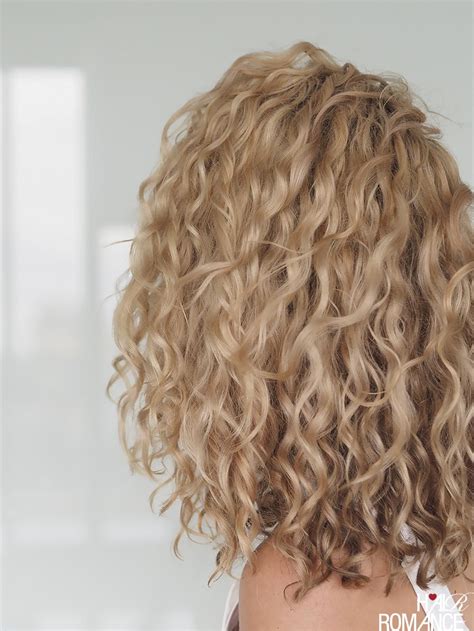 Long hair which is curled looks sexy. The best haircuts for curly hair - Hair Romance