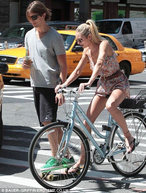 Candice Swanepoel Takes A Cycle Ride In A Traffic Stopping Playsuit