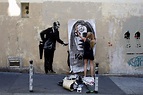 Street artist Banksy splashes Paris with works on migrants - 680 NEWS