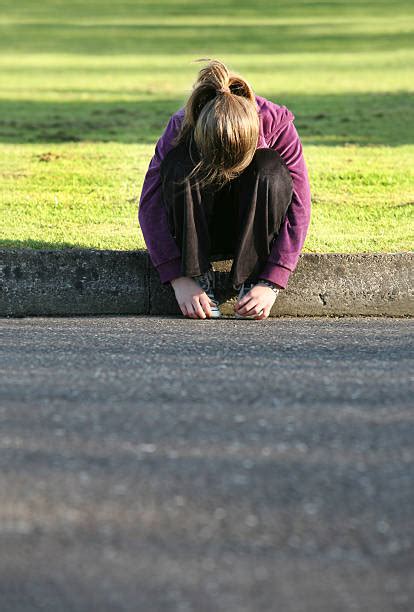 Sad Girl Crouching Stock Photos Pictures And Royalty Free Images Istock