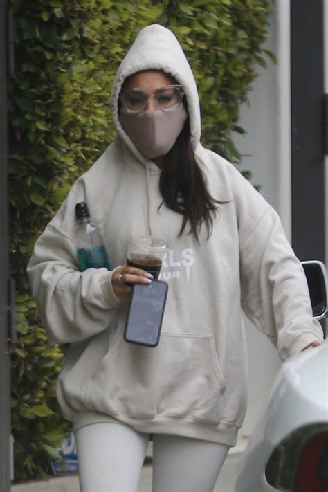 Ariana Grande Leaving The Gym Wearing A Hoodie And Face Mask In Los