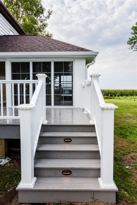 A wraparound porch is a traditional porch for an american home. Four Season Porch Addition | Spring Green, WI - Farmhouse ...
