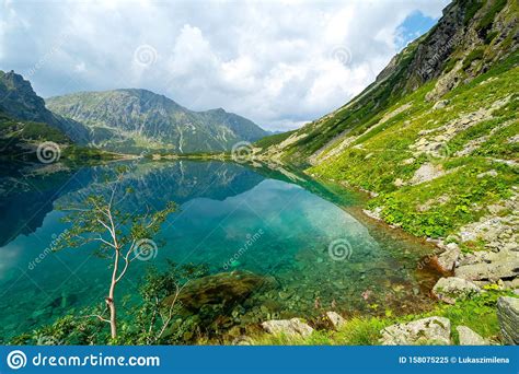Black Pond Under Rysy Mountain Lake In Polish Tatra Mountains Poland