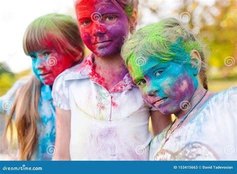 Cute European Child Girls Celebrate Indian Holi Festival With Colorful