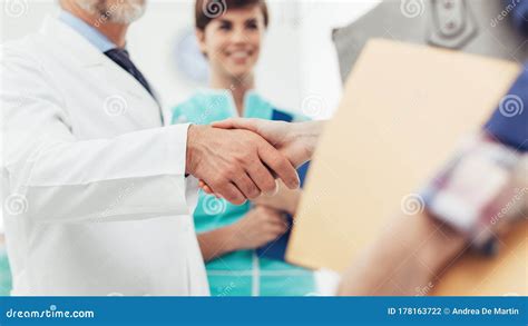 Medical Staff Welcoming A Patient Stock Photo Image Of Health
