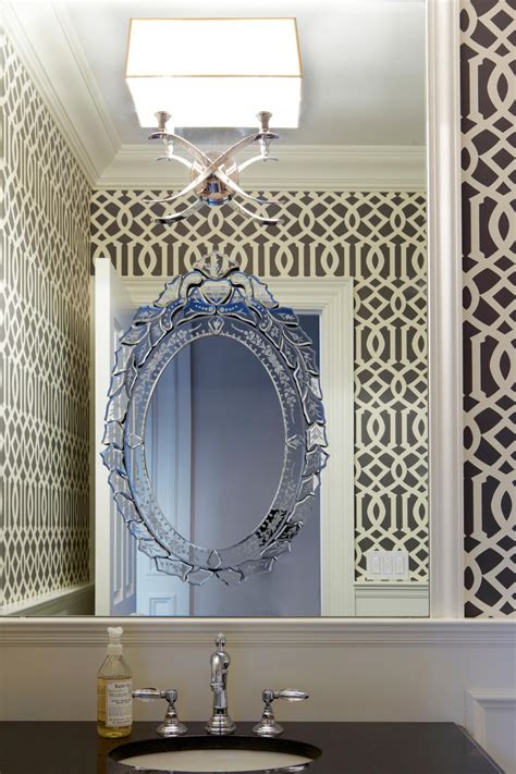 Powder Room With Patterned Wallpaper And Venetian Mirror Hgtv