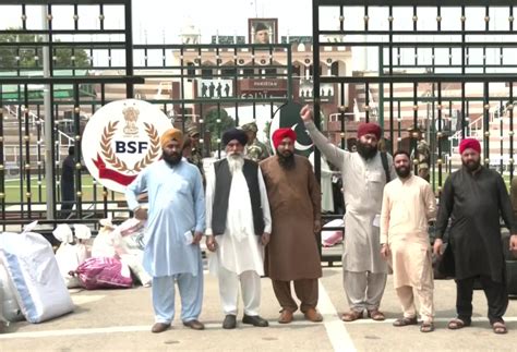 Watch Pakistan Sikh Pilgrims Arrive At The Attari Wagah Border The