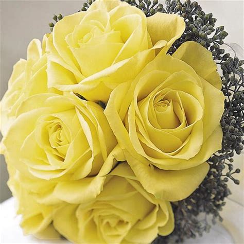 Surprise with some beautiful yellow flowers of your own today. Yellow Roses Bridal Bouquet | flowerandballooncompany.com