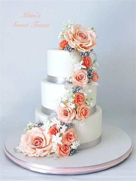cascading flowers wedding cake by mimissweettreats c… wedding cakes