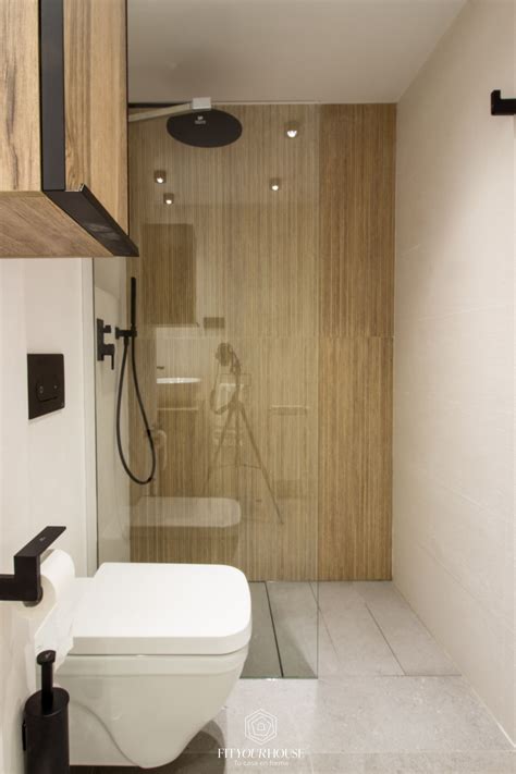 Una ducha de lujo en el baño madera hormigón y Porcelanosa Ducha