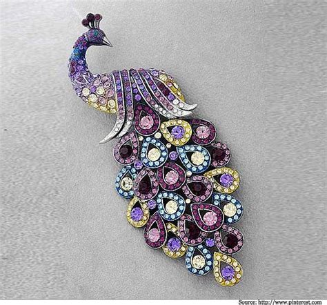 Gorgeous Swarovski Coloured Crystal Studded Peacock Brooch See More