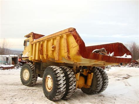 Where can i buy a dump truck in kentucky? used for sale cat 769 end dump rock truck 35 ton