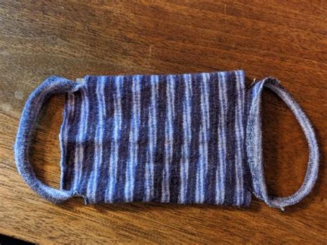 Want to learn how you can make your own face mask at home with just a sock? Make a No-Sew Face Mask out of a Sock or Leggings | Oakland Public Library