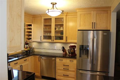 It is good for hiding flooring imperfections where it might not go exactly up to the cabinet. In keeping with the unadorned profile of the cabinet doors, simple crown molding tops off floor ...