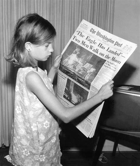 Collective Historya Girl Holds The Washington Post Of Monday July 21st 1969 Stating ‘the Eagle