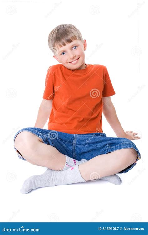 A Boy Sitting With Legs Crossed Stock Image Image 31591087