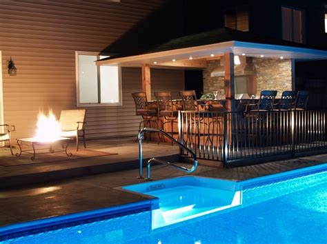 Outdoor Pool And Bar Designs Bring Out The Beauty With