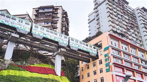 In China Trains Pass Right Through A Storey Engineering Marvel