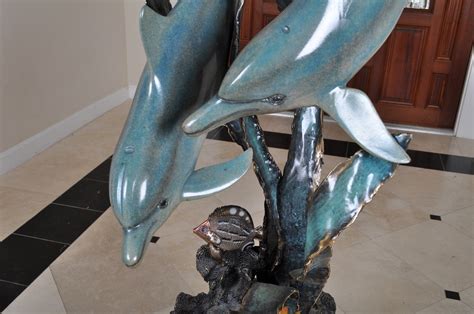 Dolphins At Play Bronze Sculpture By Laurie Ward Ebth