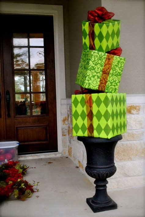 This Topiary Is Made Out Of Old Boxes And Wrapping Paper Christmas