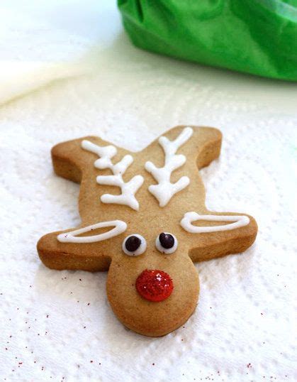 Turn gingerbread cookies upside down and decorate with icing to resemble reindeer, see photo for an easy reference. upside down gingerbread men make flat laying reindeer ...