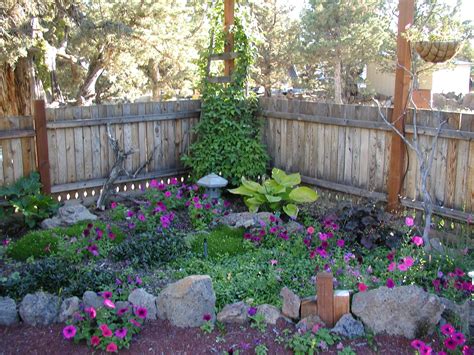 Landscaping ideas for small backyards. shade gardens can be beautiful! These petunias I get at ...