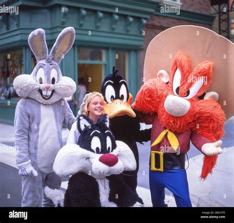 Young Girl With Looney Tunes Characters At Warner Bros Movie World