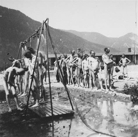 Survivors In Ebensee Use The Portable Shower Unit Set Up For Them By