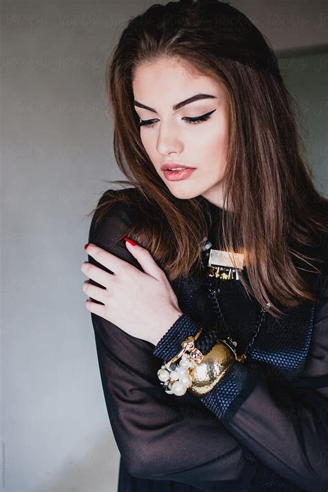 Portraits Of A Beautiful Young Woman In A Vintage Black Dress By Stocksy Contributor Natasa