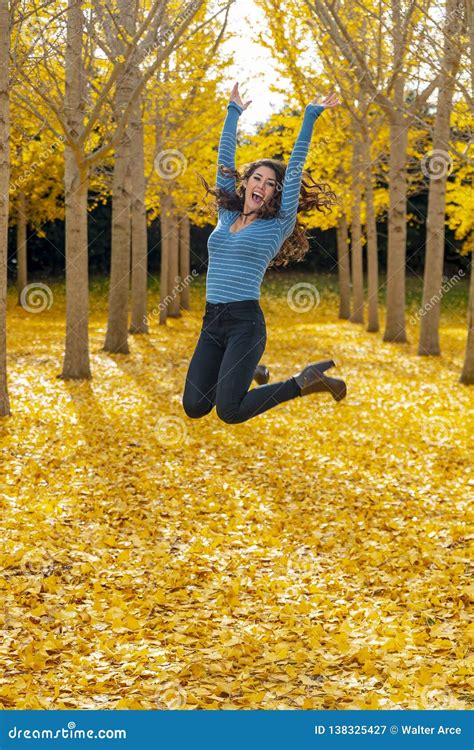 Brunette Model Enjoying A Fall Day In Fall Foliage Stock Image Image Of Enjoying Fall 138325427
