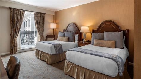 All beds have a bed linen set. New Orleans Hotel Suites with Jacuzzi | Omni Royal Orleans