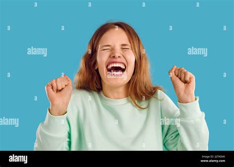 Portrait Of Funny Young Woman Or Teen Girl Laughing Or Screaming With