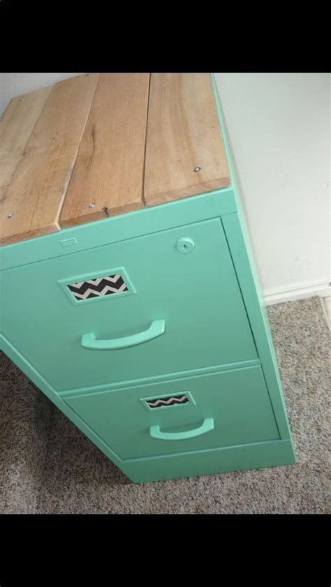 Maybe you would like to learn more about one of these? Upcycle an old filing cabinet. Like the idea to add wood ...