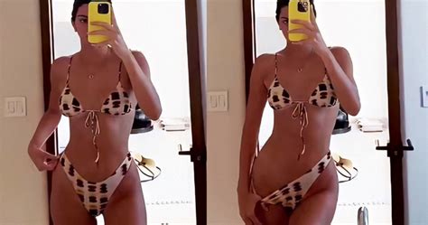 kendall jenner cheekily pulls down bikini bottoms as she flaunts figure in cow print swimsuit