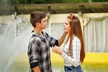 Enamoured kiss teens. stock photo. Image of portrait - 76032018