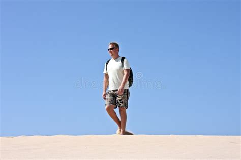 Young Guy Walking In The Desert Stock Image Image Of Backpack