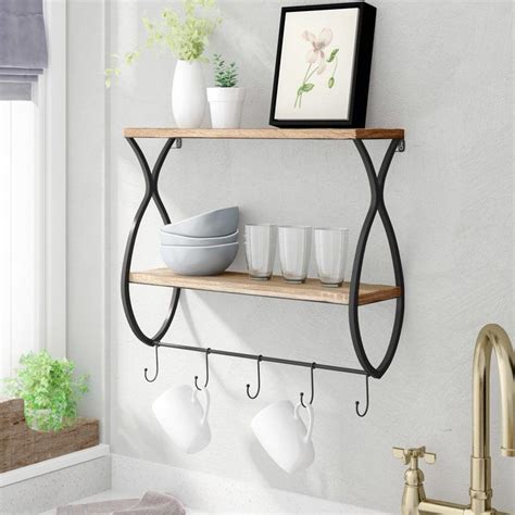 It drew heavily on past products, but was also a great chance for us to design a product that is a bridge between the office and the home. Zander Wood and Metal Floating Wall Shelf | Floating wall ...