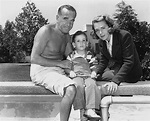 Entertainers Al Jolson and Ruby Keeler, with son Al Jr., pose poolside ...