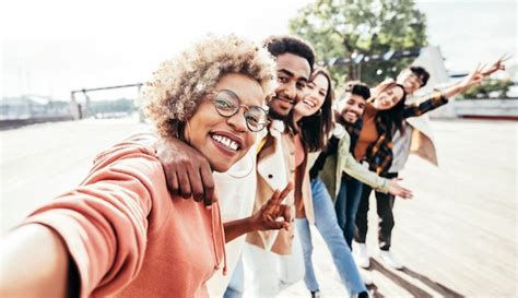 Premium Photo Multiracial Best Friends Taking Selfie On City Street