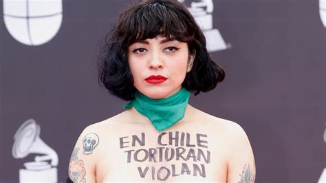 latin grammys mon laferte exposes bare chest in political protest