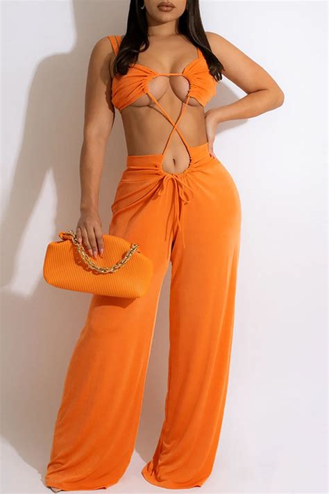 Fashion Orange Sexy Solid Hollowed Out Patchwork Spaghetti Strap Straight Jumpsuits For Sale