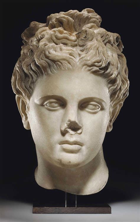 A Roman Marble Head Of Apollo Circa Late 1st Early 2nd Century Ad