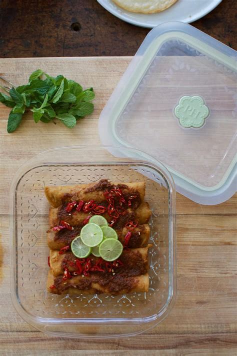 Cover enchiladas with remaining enchilada sauce and spread it out to completely cover the tortilla edges. Freezer-Friendly Picadillo Enchiladas | ¡HOLA! JALAPEÑO