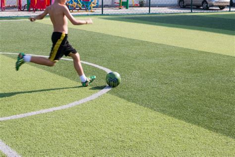 Children Play Football In The Lawn Stock Photo Image Of Field Male