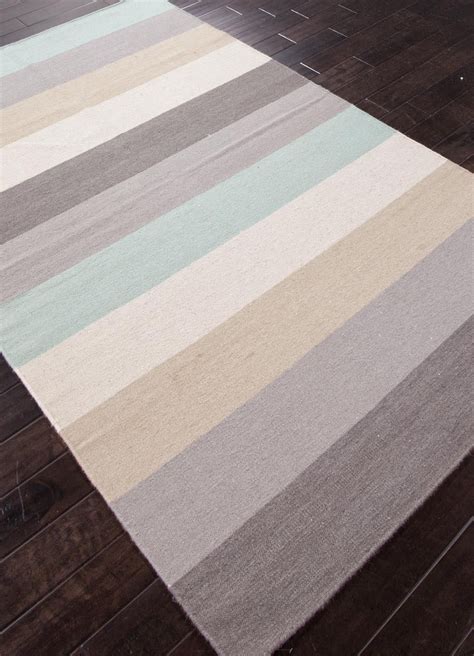 (nautical stripes or a sculptural piece of coral are always welcome, too.) while many of these homes from the ad. Wide Beach Sand and Aqua Striped Rug | Beach house decor ...