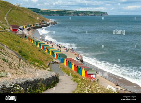 Multi Coloured Beach Huts At Whitby Beach Whitby Yorkshire England