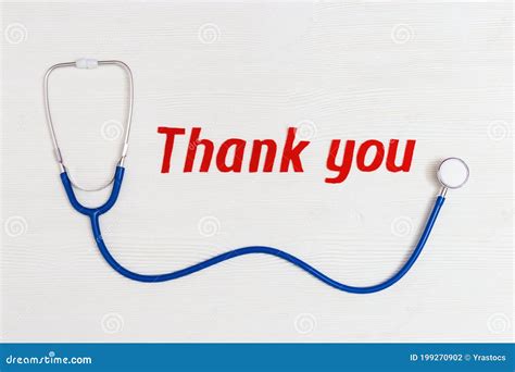 Healthcare And Medical Concept Stethoscope Blue Colored And Text Thank