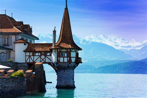 This Oberhofen Castle With Its Tower On The Water Lies On The Right