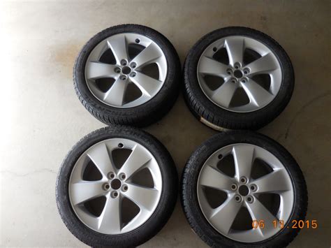 Or you can go with a set of aftermarket wheels that are bigger, wider and with less. For Sale - Prius 5 Wheels w/ New Tires | PriusChat