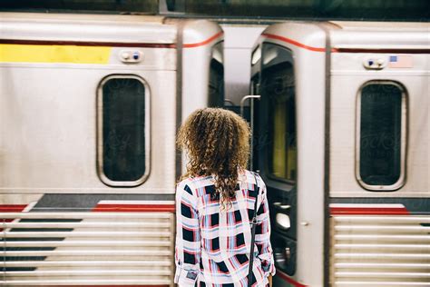 adult woman waiting for subway by stocksy contributor jayme burrows stocksy